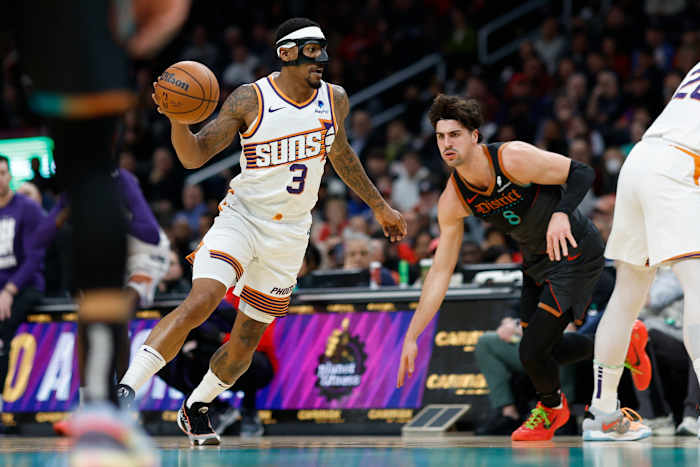 Phoenix Suns guard Bradley Beal (3) drives to the basket past Washington Wizards forward Deni Avdija (8) in the first half at Capital One Arena.